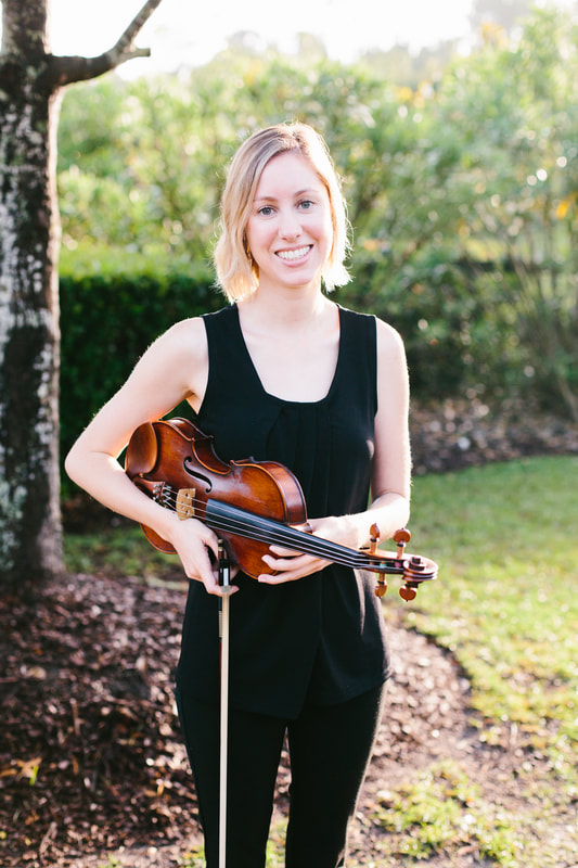 Erin Norton, SC Music Lessons LLC Instructor, Holding her Violin
